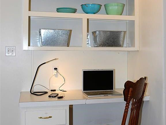 Your own office workspace in this efficiently designed in-kitchen workspace.