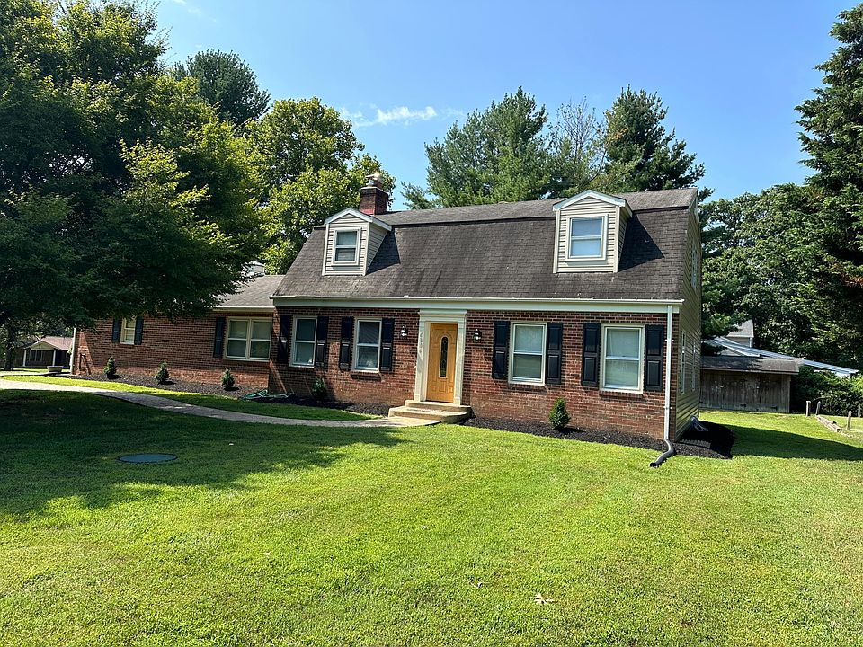 Gorgeous brick Colonial on 1 acre in River Hill School District!