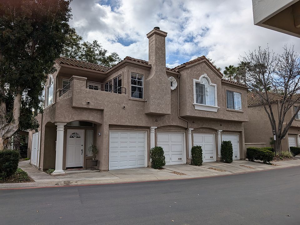 UNIT IS ALL 2ND LEVEL IN PICTURE. GARAGE NEXT TO ENTRANCE DOOR. CARPORT ACROSS FROM FRONT DOOR