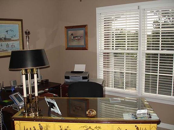 Master on the main. One of three upstairs bedrooms used as an office.