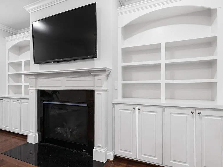 family room with built-in shelf