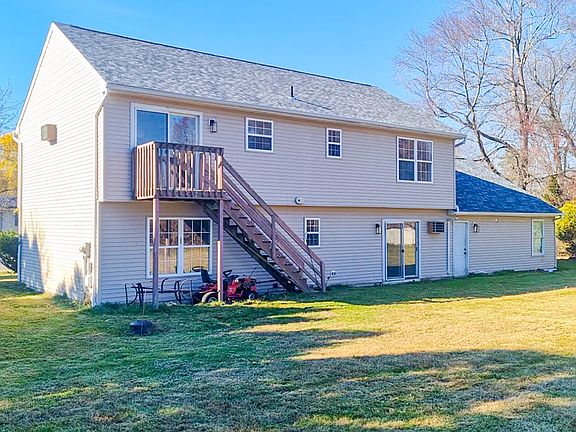 Raised Ranch 2300 sq ft, Remodeled Nov. 2025 Kitchen, SS Appliances including Fridge, Electric Stove, Dishwasher, Microwave, Sleek White Quartz countertops, Crisp White Cabinetry,Gray laminate flooring on both floors, LED lights, Freshly Painted both fl