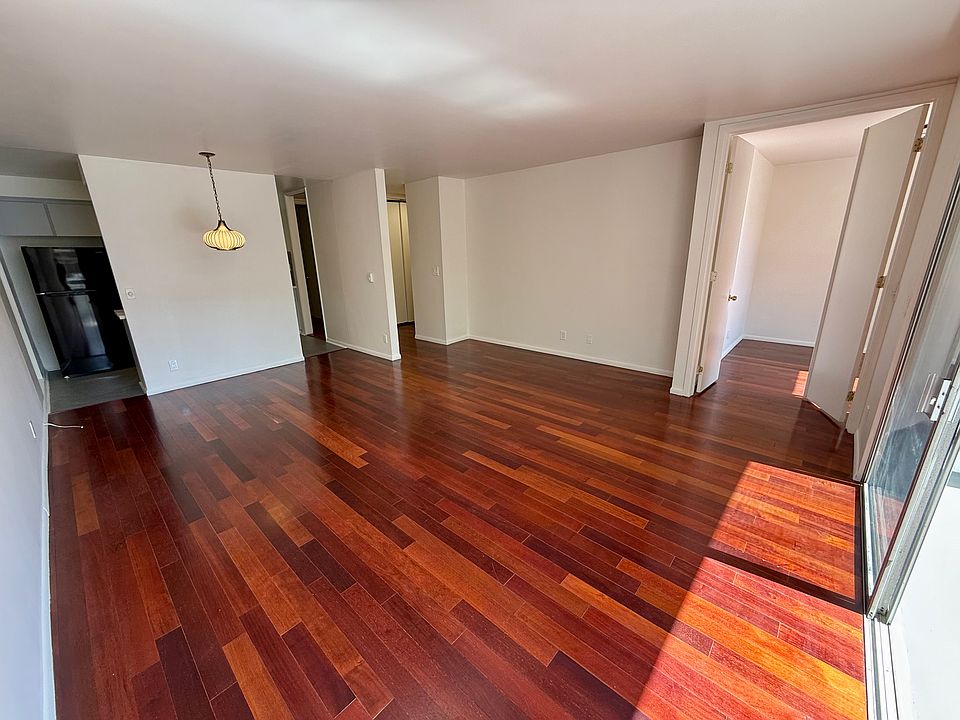 Main living and dining room with original light fixture