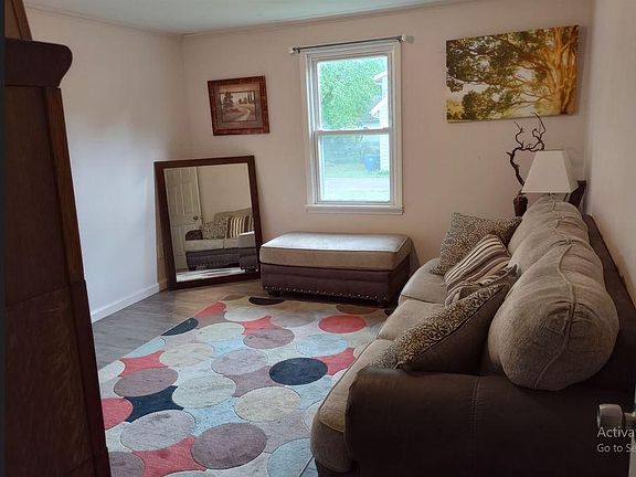 First floor bedroom which was also set up as an office with a pull out couch. Very spacious, can fit a king size bed. Great view of the backyard.