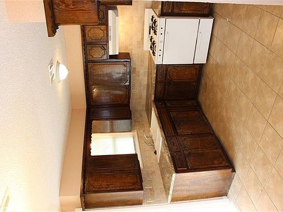 Kitchen - new tile, countertops, window.