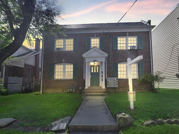 Twilight view of this 4-unit apartment building (Unit #2 is available for rent)