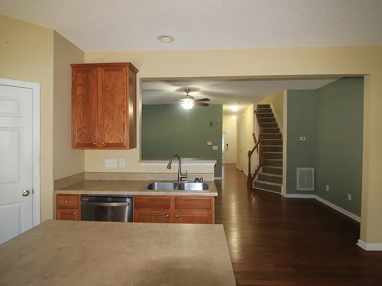 A view from the kitchen facing the living room.
