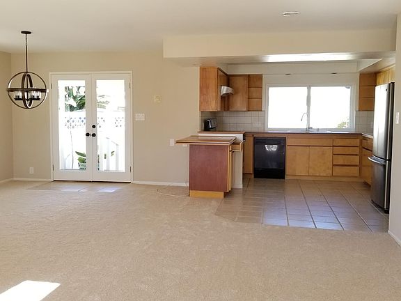 Living Room, Dining Area, and Kitchen.