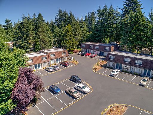 Large complex with two parking spaces in front of each unit, with plenty of visitor parking