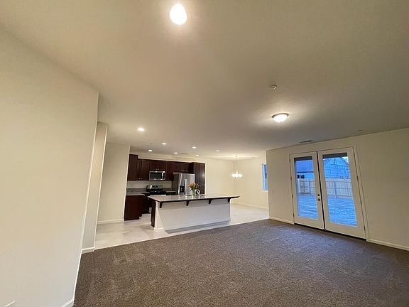 9 foot high ceilings and very spacious living room and kitchen. Upgraded French doors for the backyard.