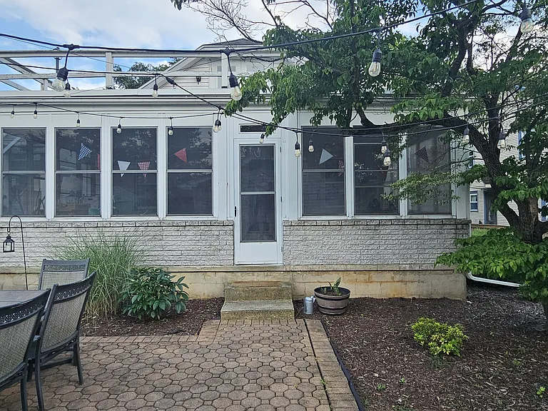Back view of home with patio (furniture not included)