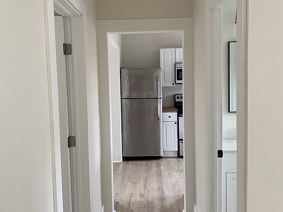 Hallway leading to kitchen