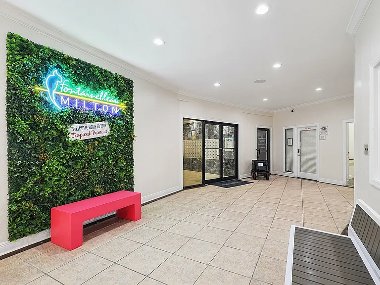 Take a pic with our lush green selfie wall