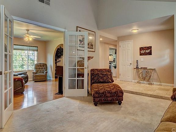 Entry way opens to formal living. Beautiful French doors lead into family room. Great for entertaining large groups or close doors for privacy.