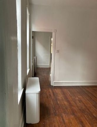 View of passage from 2nd dining room into Formal dining room