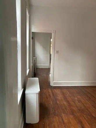 View of passage from 2nd dining room into Formal dining room