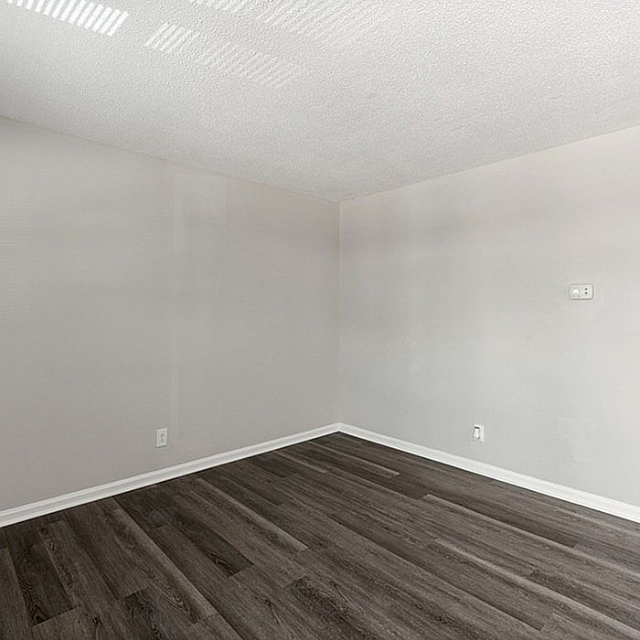Explore the elegance of minimalism with this contemporary space designed for versatile living.