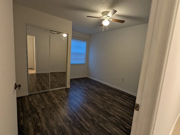 Bedroom #2, mirrors are sliding closet doors