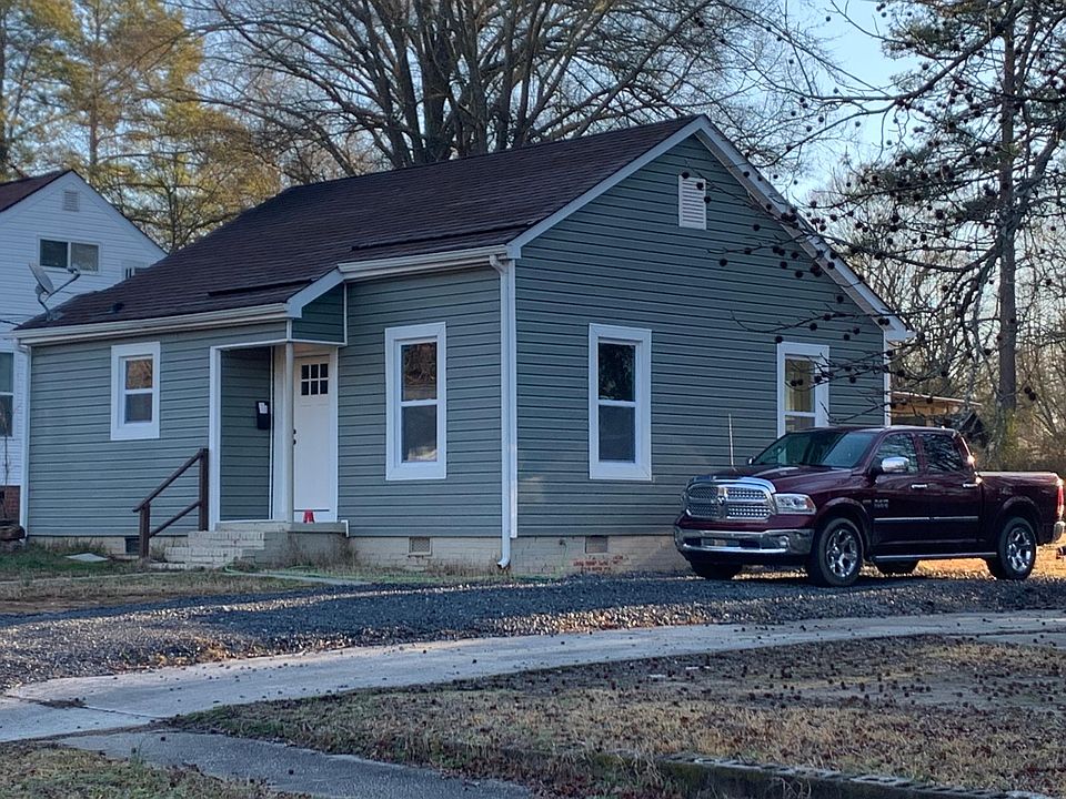 new vinyl siding, windows and roof. Deep driveway. Large flat yard.