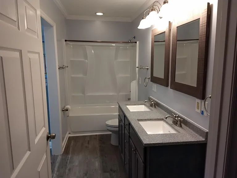 Nicely appointed bathroom. Laundry hookups.