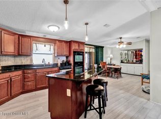 729 Gladiolus Dr, Barefoot Bay, FL 32976