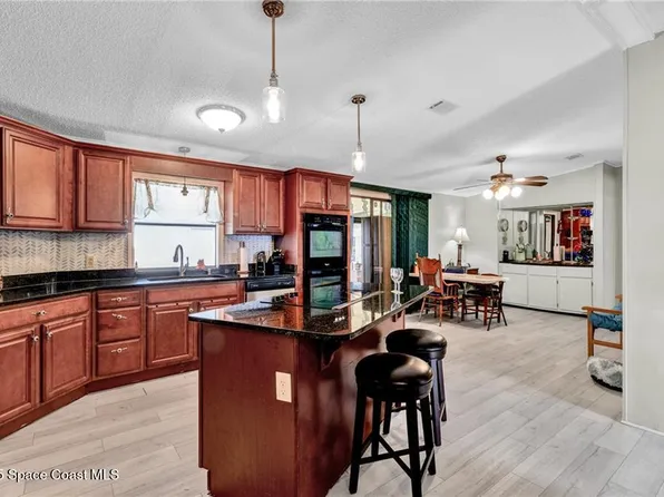 729 Gladiolus Dr, Barefoot Bay, FL 32976