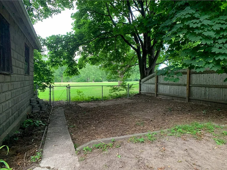 Back yard leading to park land and river
