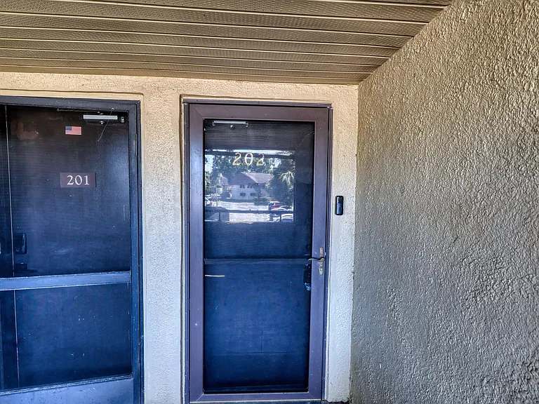 10755 Village Club Cir #202 — Photo 2
