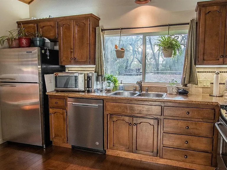 Kitchen with fridge, dishwasher