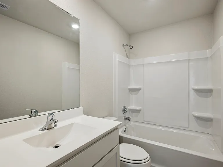 Shower/tub combination in the bathrooms.