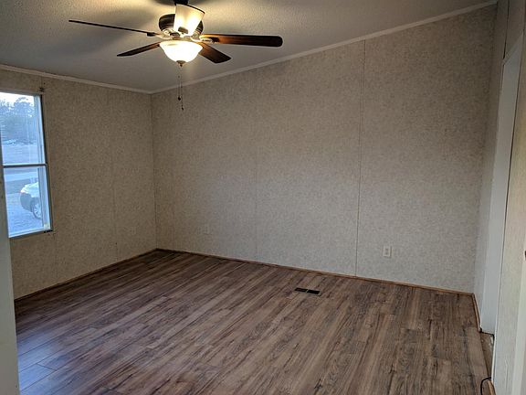 one of two smaller bedrooms