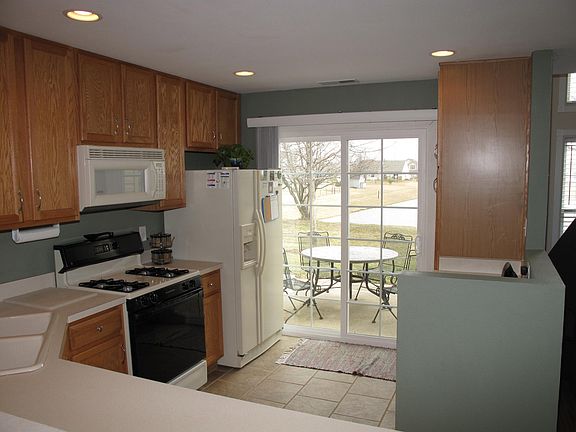 View looking into the Kitchen from the Dining Room.