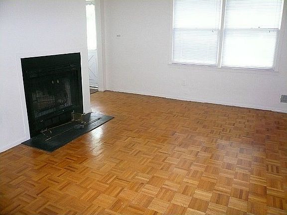 FAMILY ROOM - WOOD FLOOR & FIRE PLACE