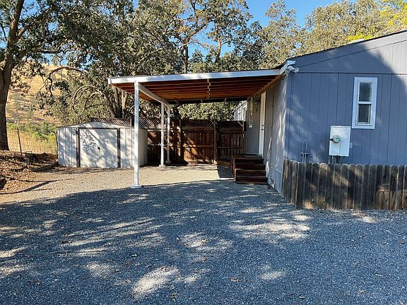 Carport and storage shed