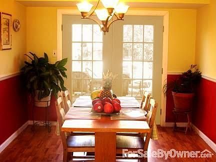 Dining Room
						:
						New French doors open to spacious fenced backyard, crown molding, Pergo flooring