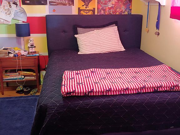 Generously sized 3rd bedroom on upper-level, large enough for queen bed and add'l furniture. Large closest.