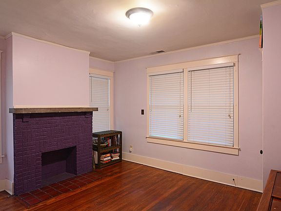 Front bedroom w/ fireplace