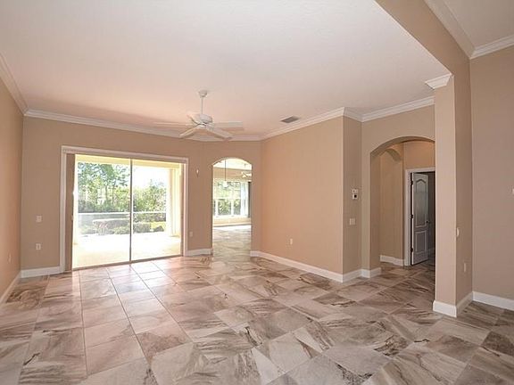 The dining/living area is spacious and offers easy access to the outdoors.