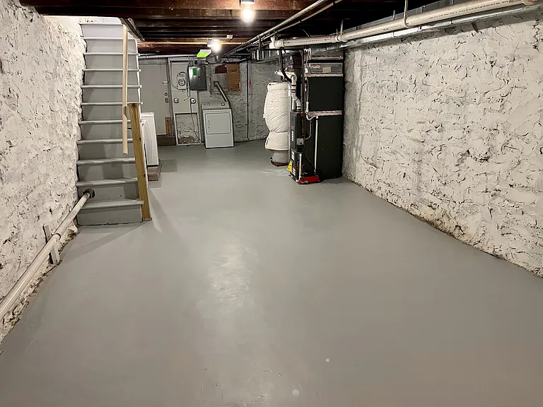 Walk-out Basement - 12.5 x 40 - plenty of room for storage. Easy secure storage for bikes.