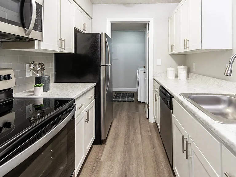 All kitchens come with beautiful stainless-steel appliances and ample cabinetry.
