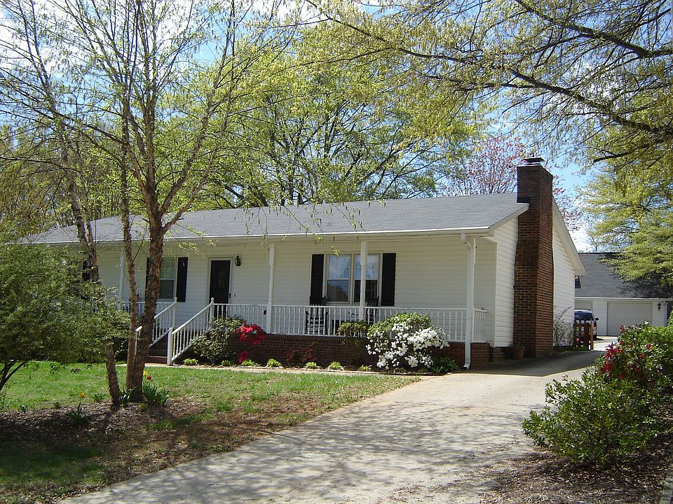 front of house - note porch along entire width of house
