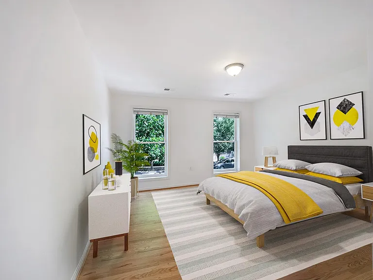 Bedroom 2. This image shows a virtually furnished space. Bedrooms come unfurnished.