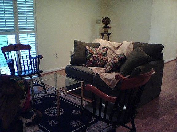 View of Living Room and Patio Doors with Plantation Shutters