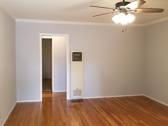 Living room and real hardwood floors.