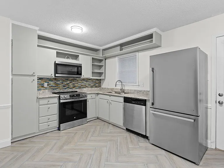 1303 W Meadowview Rd #F — Photo 2