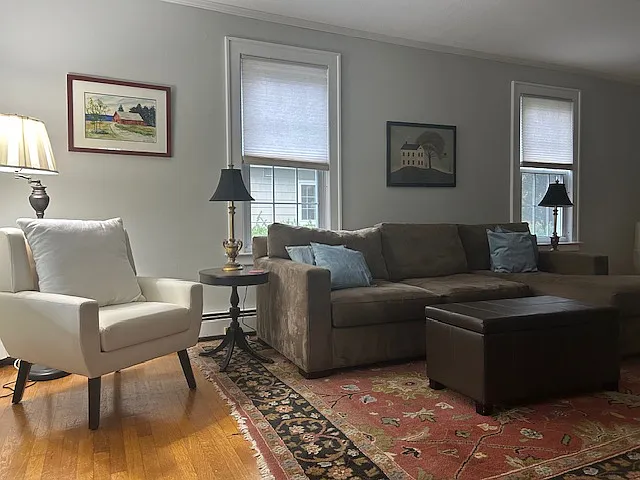 lots of seating in the living room to visit or watch tv