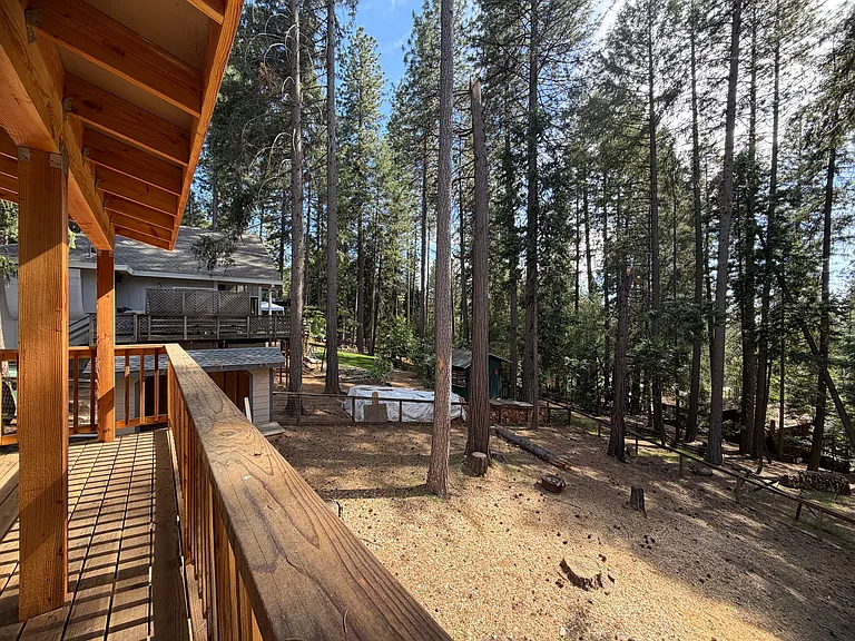 Backyard looking from covered deck