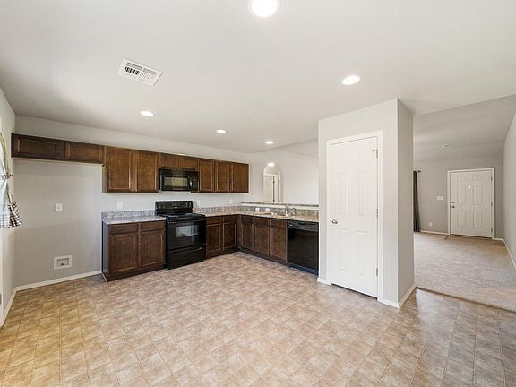 4th image of 12803 E 67th Pl N