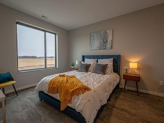 Spacious bedrooms with modern carpet--keep your feet warm without collecting dust