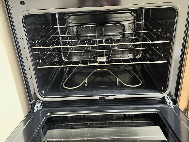 Inside of new stainless steel stove